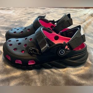 Post Malone pink and black crocs